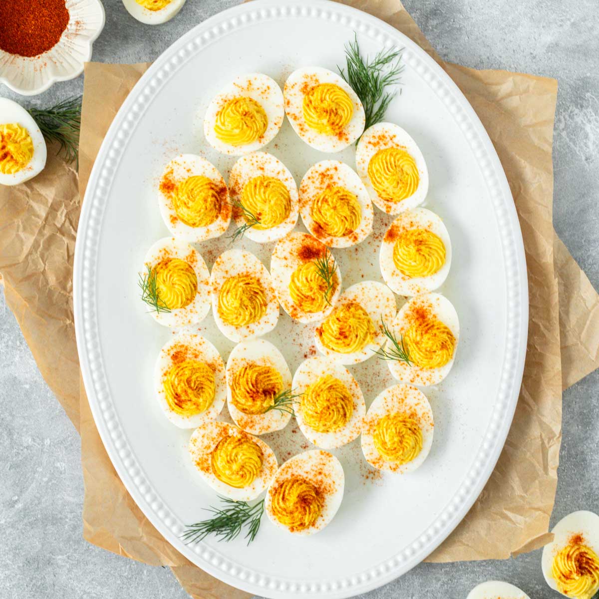 These Instant Pot Deviled Eggs are a simple and quick appetizer recipe made with hard boiled eggs filled with a spicy and saucy egg yolk filling. We love serving this recipe as a healthy appetizer or easy snack.