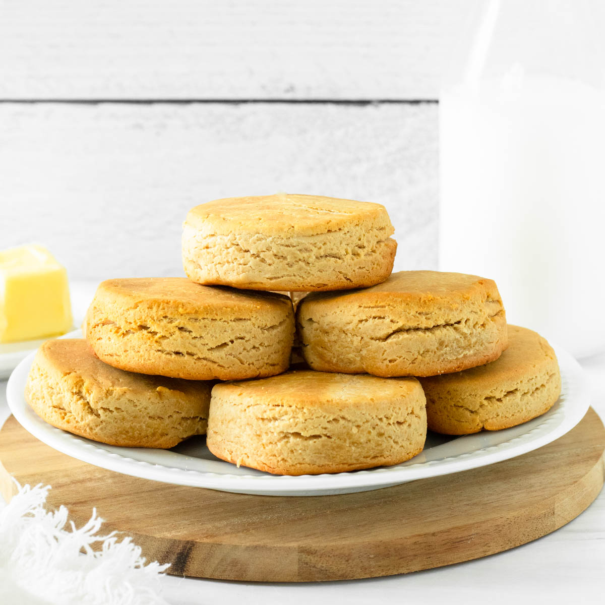 These gluten-free biscuits are flaky and buttery homemade biscuits made with gluten-free flour and baked into the perfect tender and soft biscuits.