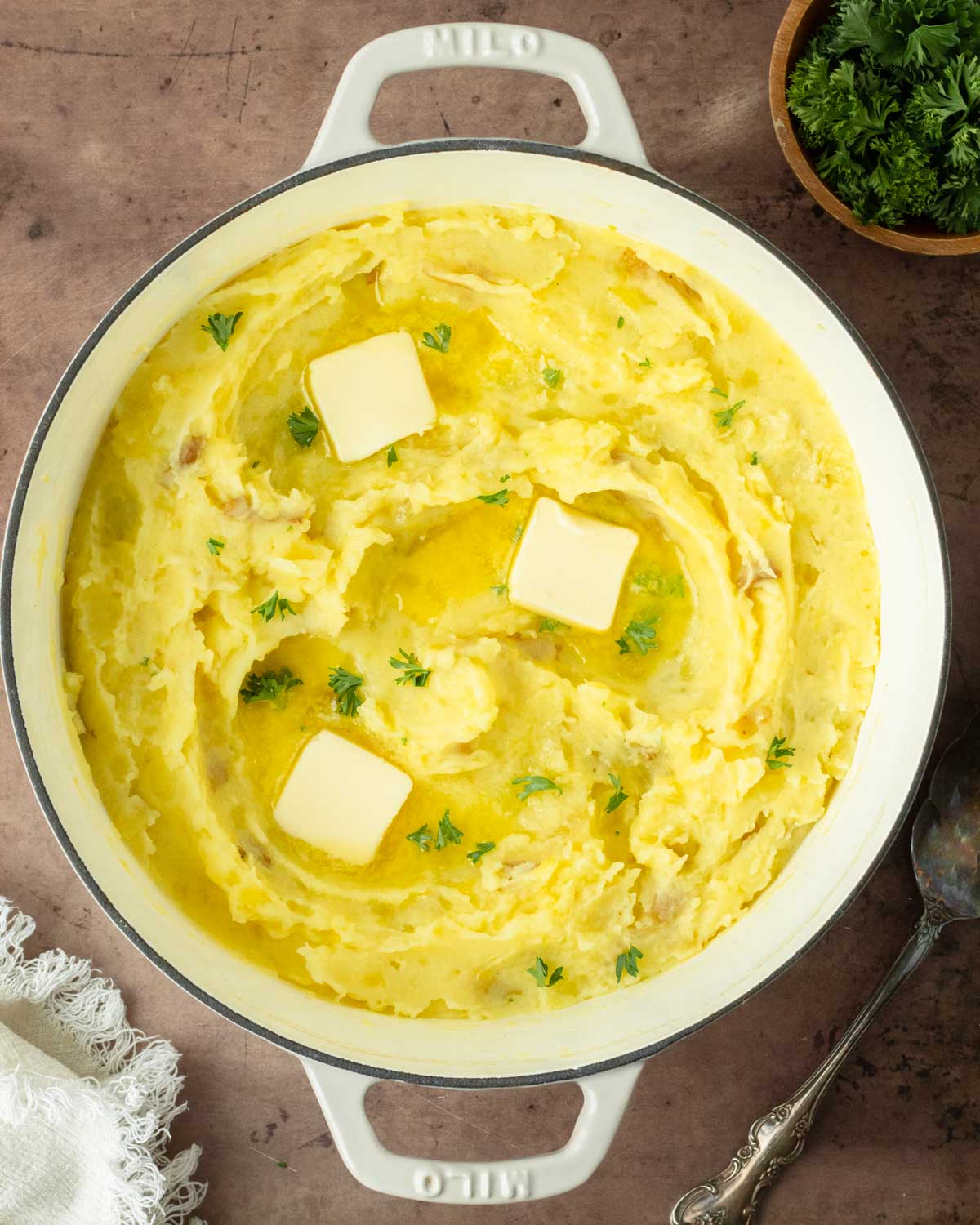 These classic mashed potatoes are a simple, flavorful Yukon Gold mashed potato recipe perfect for an easy side dish for a weeknight dinner and a great holiday side dish recipe.