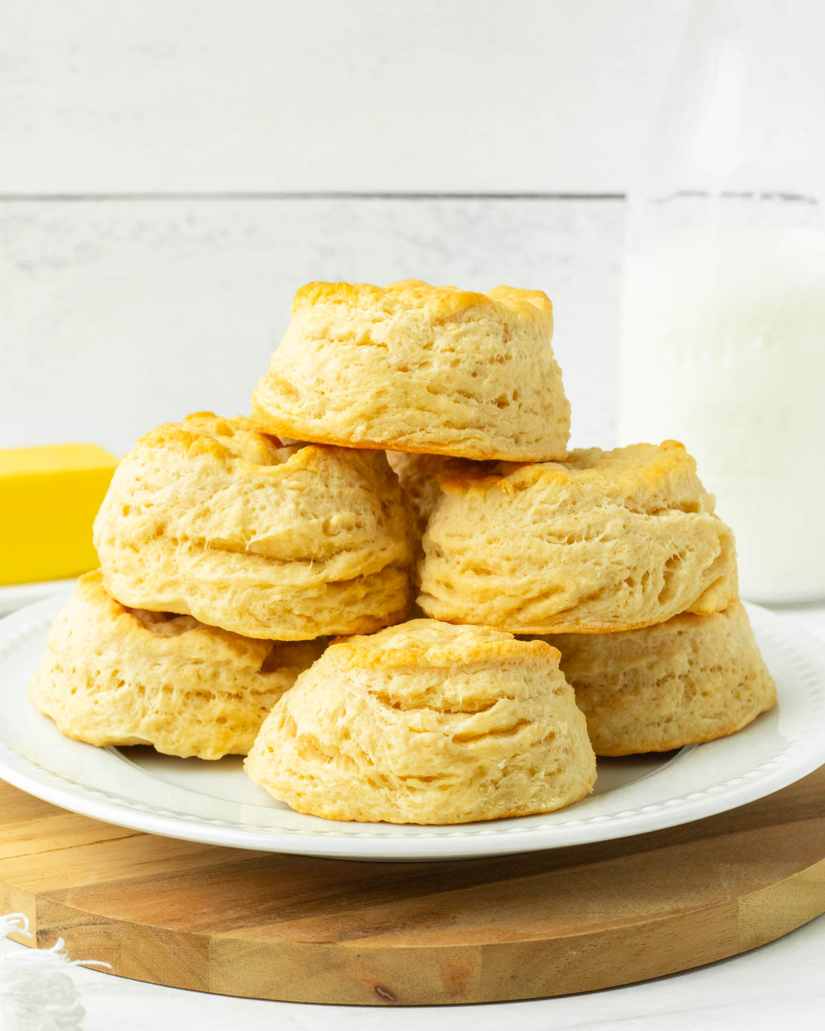 These easy homemade biscuits are the best buttery, flaky biscuits made with simple ingredients for a flavorful classic biscuit recipe. We love making these biscuits for a classic breakfast like biscuits and gravy but they are also great in desserts like strawberry shortcake.