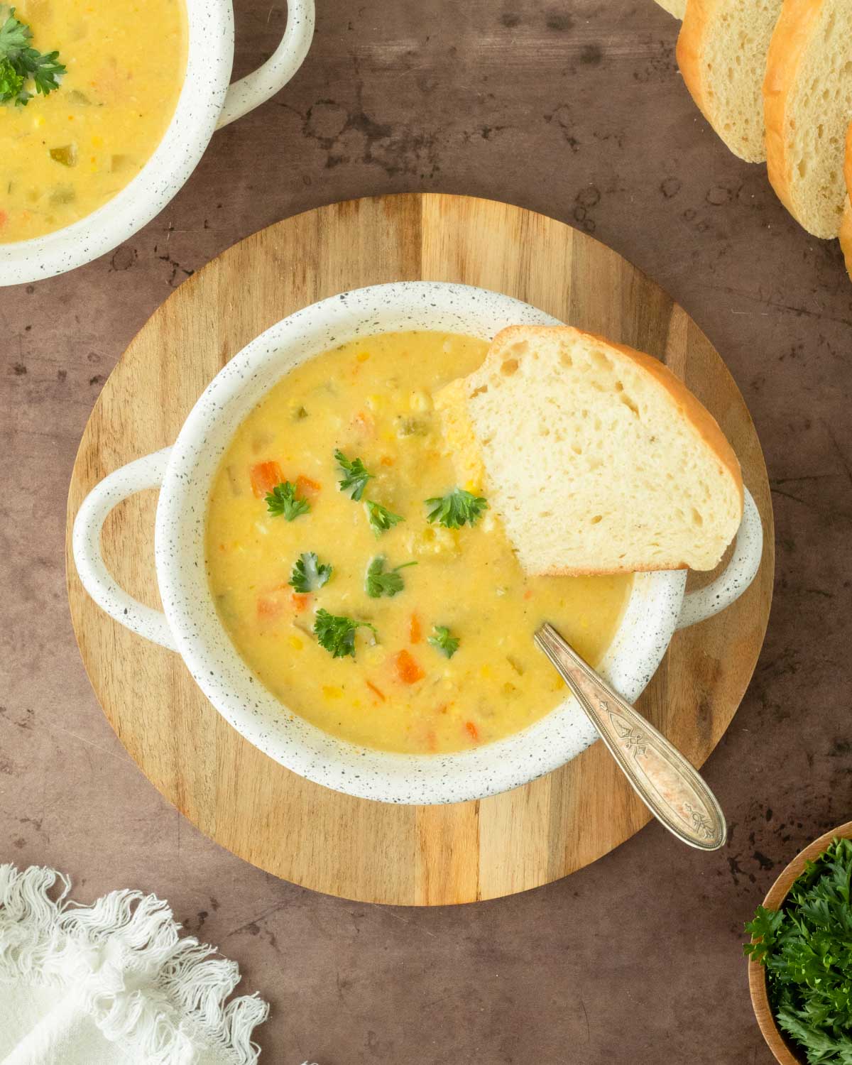 This corn chowder recipe is a homemade soup loaded with fresh corn and potatoes and best served with homemade bread for a flavorful, creamy, comfort food.