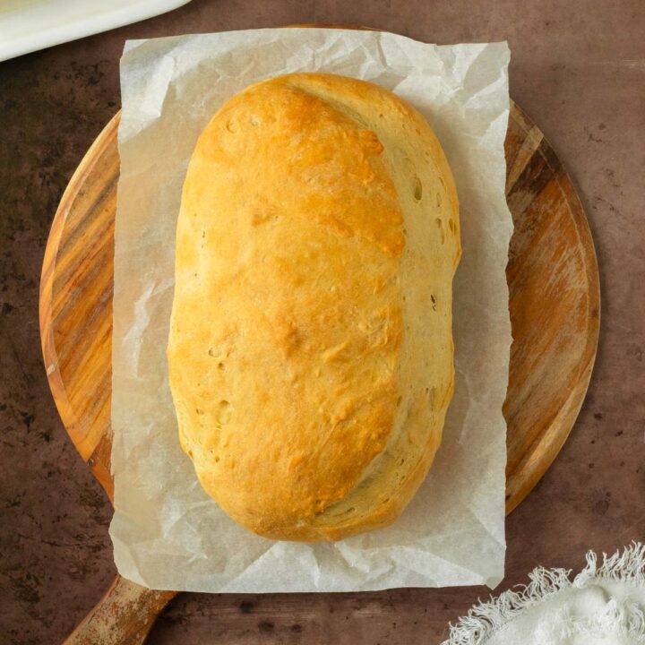 This homemade Italian bread recipe is an easy yeast bread recipe made with simple ingredients for a flavorful, soft bread perfect for serving with pasta or homemade lasagna and great for making into garlic bread.