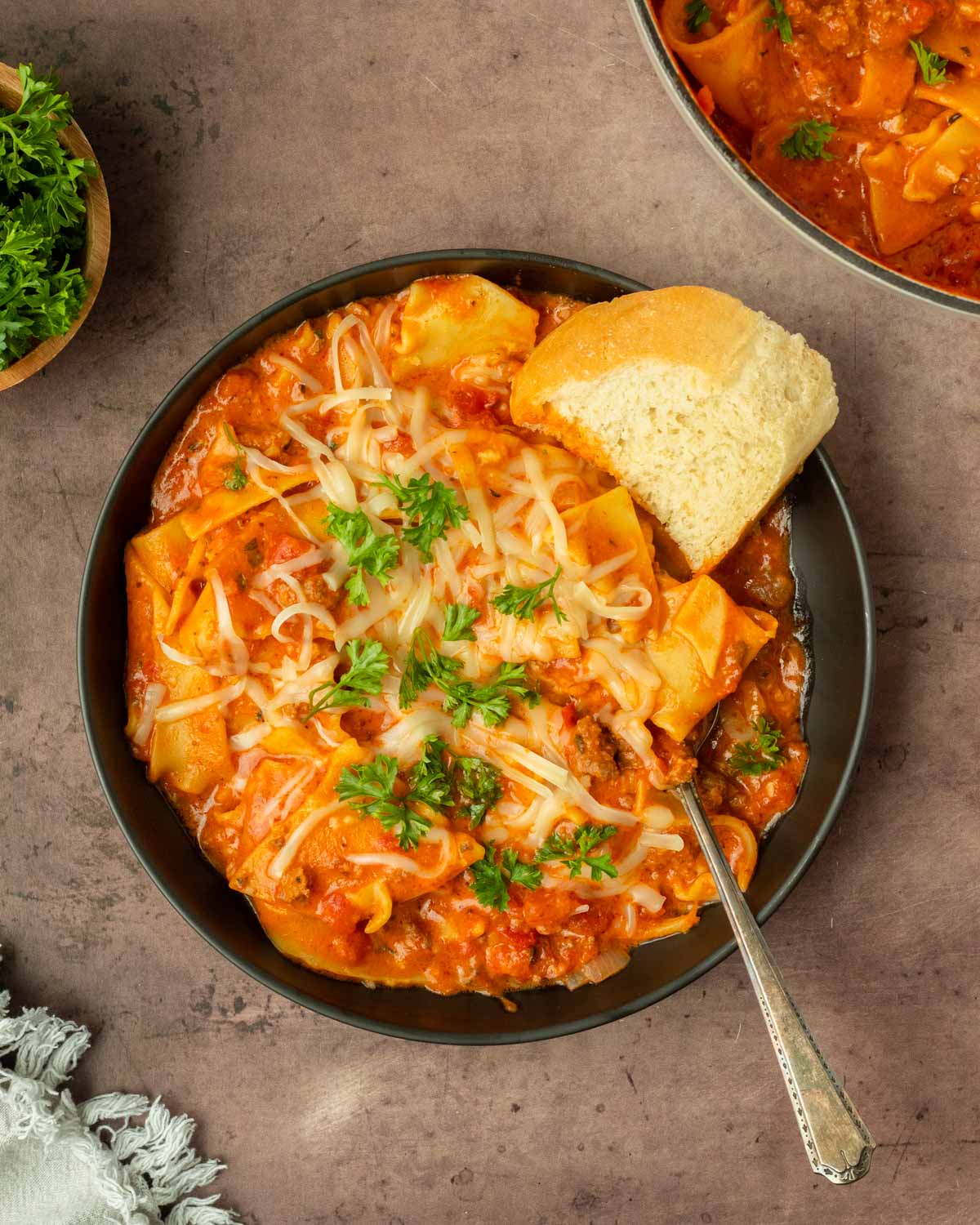 This lasagna soup recipe is an easy one-pot twist on a classic comfort food recipe. Made with classic lasagna ingredients, this recipe has all of the classic flavors of lasagna in a cozy cup of soup.