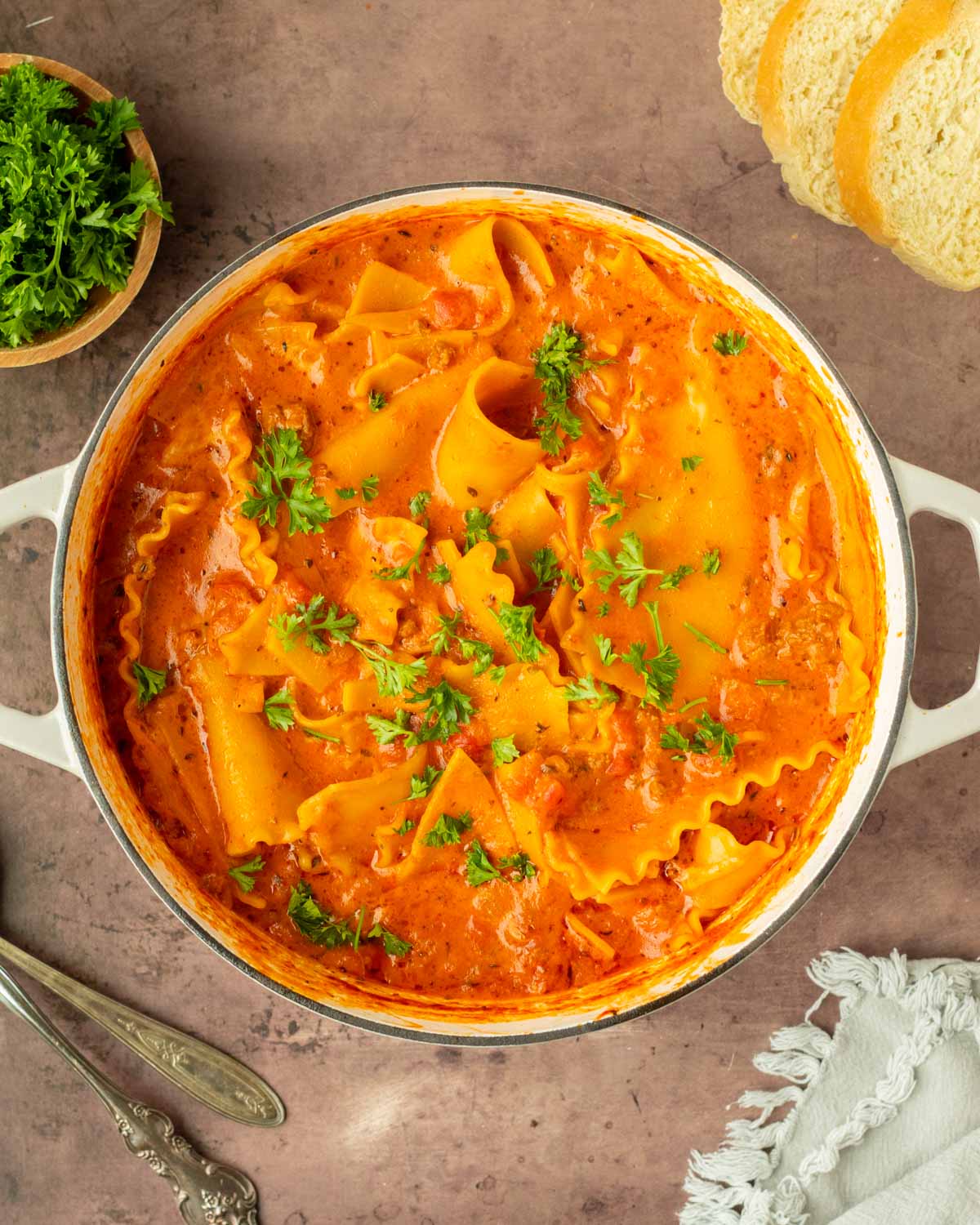 This lasagna soup recipe is an easy one-pot twist on a classic comfort food recipe. Made with classic lasagna ingredients, this recipe has all of the classic flavors of lasagna in a cozy cup of soup.