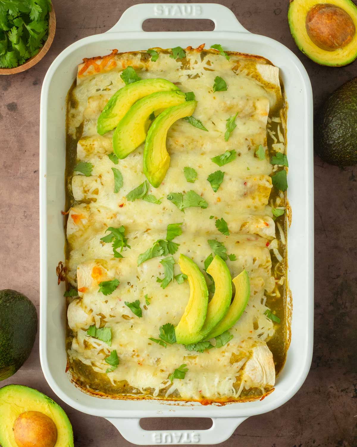 These salsa verde chicken enchiladas are an easy, filling and flavorful one-pan dinner made with simple ingredients and ready in 30 minutes for a quick and easy weeknight dinner.