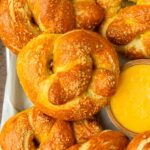 These homemade soft pretzels are perfectly chewy on the outside and soft on the inside, plus they are made with only 8 pantry-staple ingredients for an easy and delicious homemade pretzel recipe.