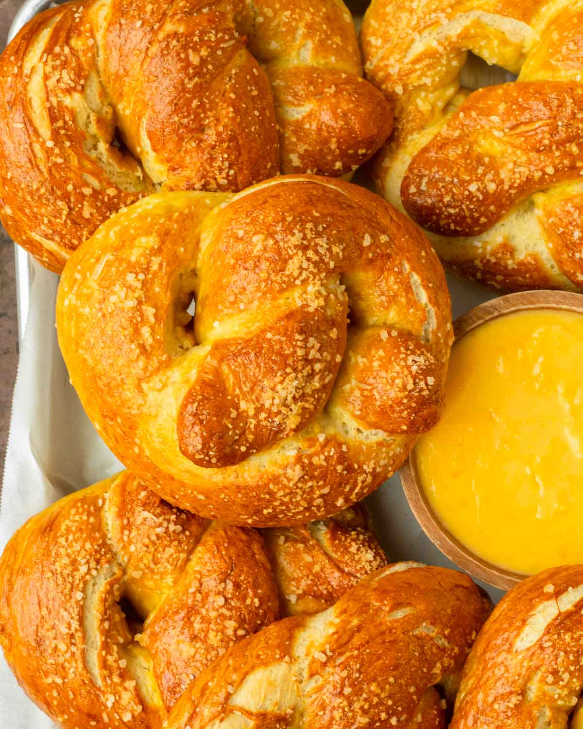 These homemade soft pretzels are perfectly chewy on the outside and soft on the inside, plus they are made with only 8 pantry-staple ingredients for a quick, easy and delicious homemade pretzel recipe.