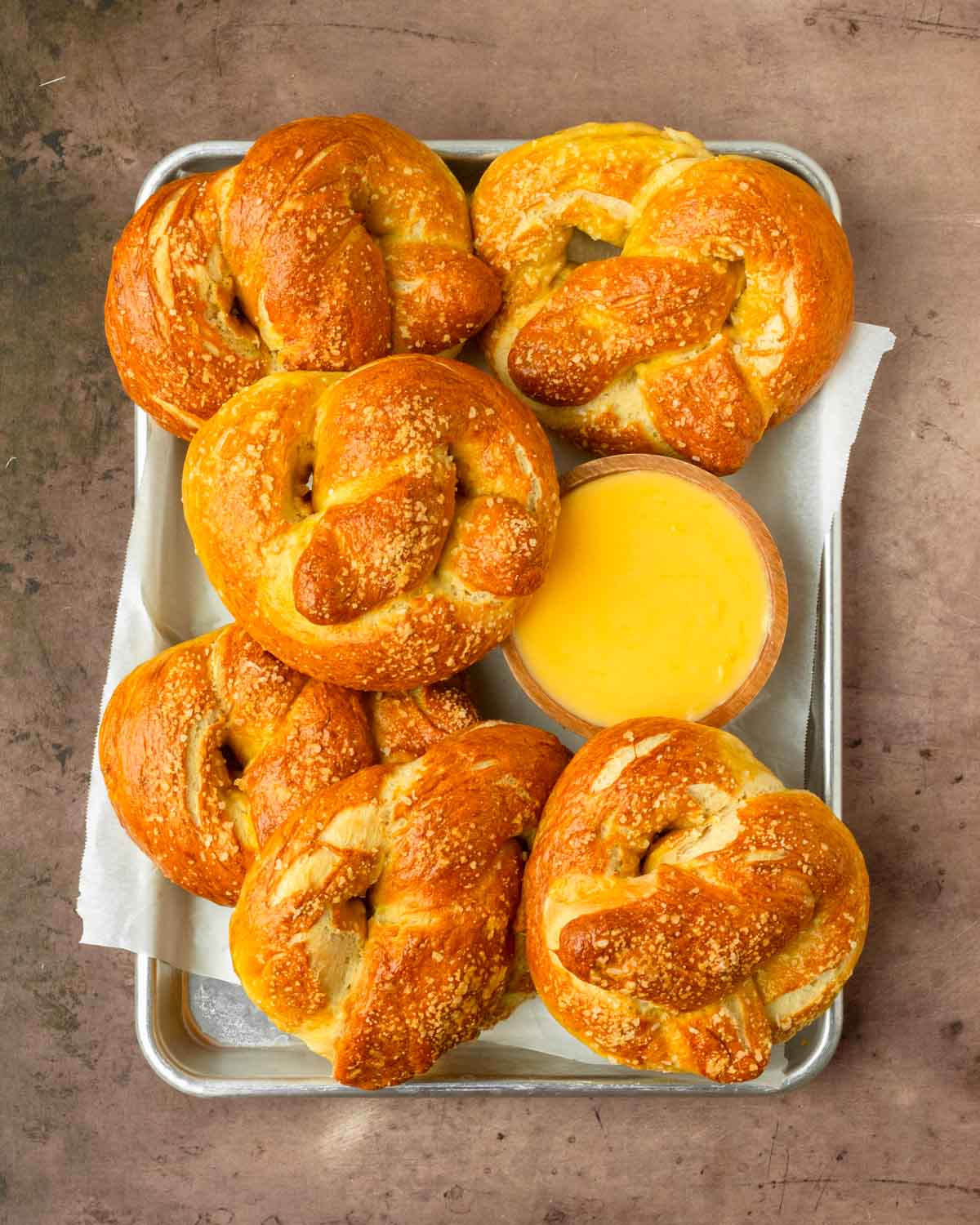 These homemade soft pretzels are perfectly chewy on the outside and soft on the inside, plus they are made with only 8 pantry-staple ingredients for a quick, easy and delicious homemade pretzel recipe.